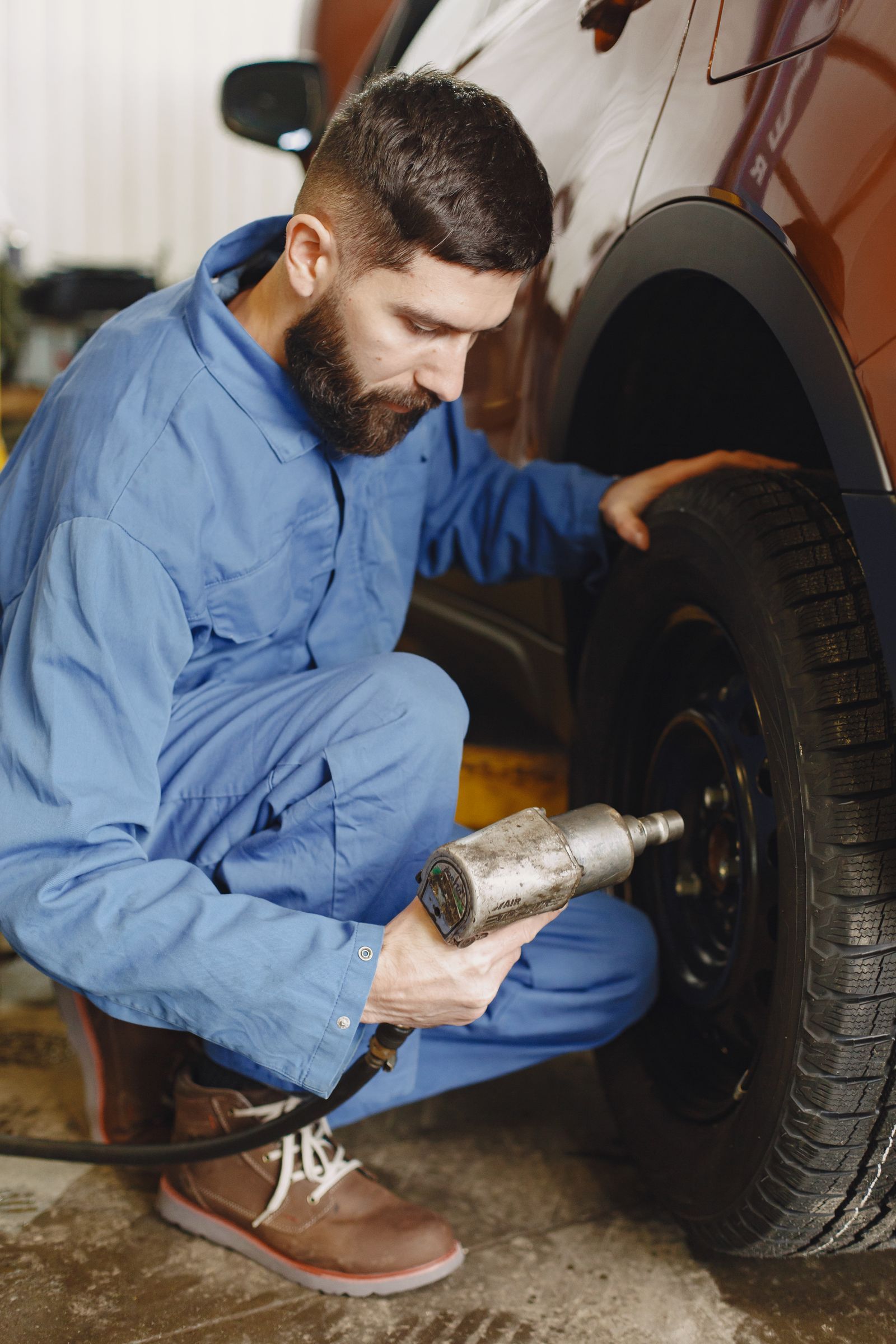 A tire being swapped with a wrench