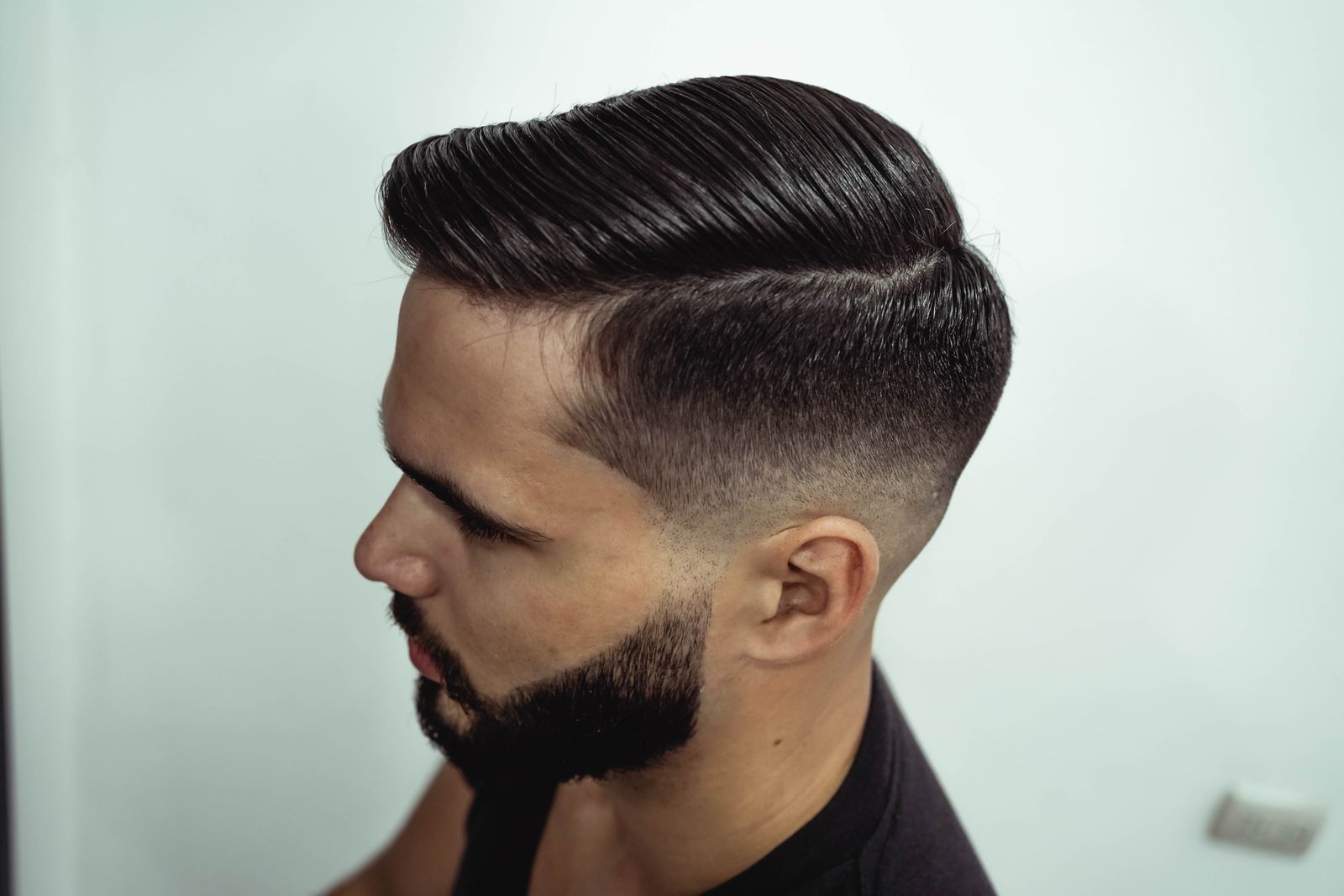 A pompadour with a faded side